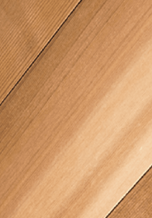 A close up of the wood grain on a floor.