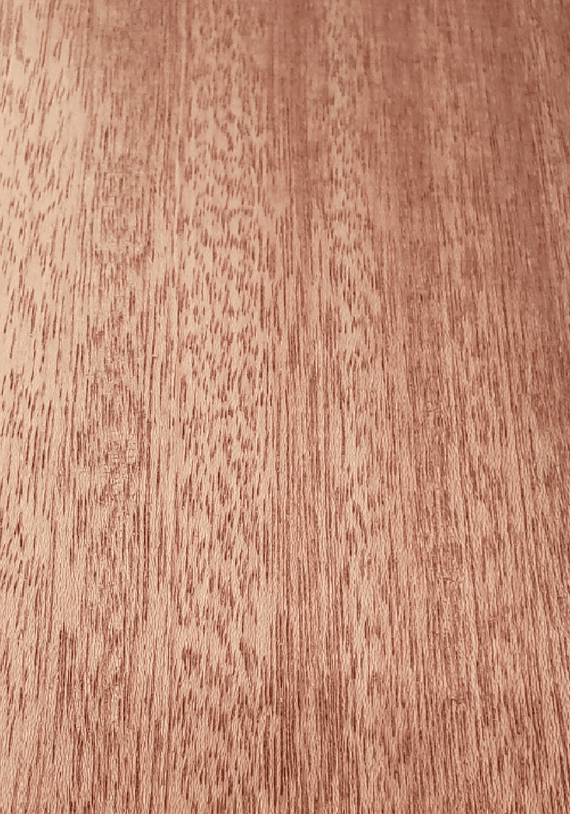 A close up of the wood grain on a surface