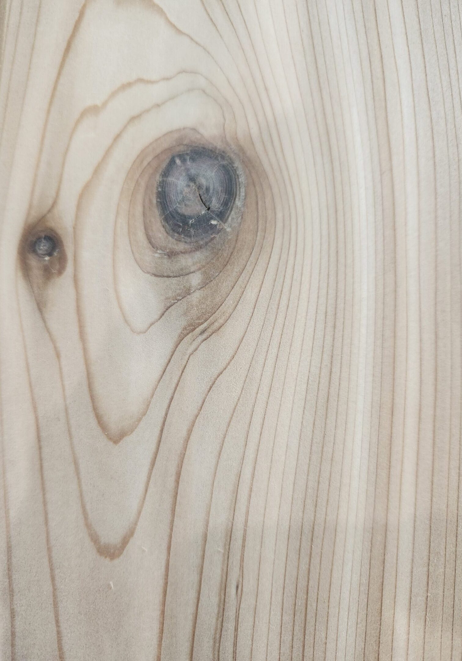 A close up of the wood grain on a table.